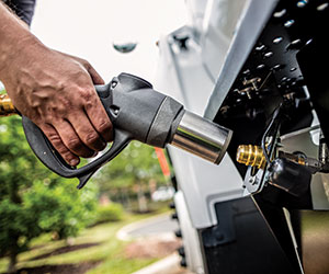 This photo shows a propane tank and pump to fuel propane school buses.