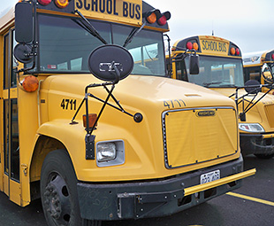 Photo of the Special School District of St. Louis county school bus fleet.
