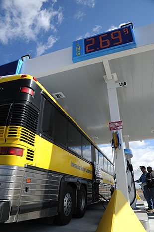 Photo of a bus at a fueling station